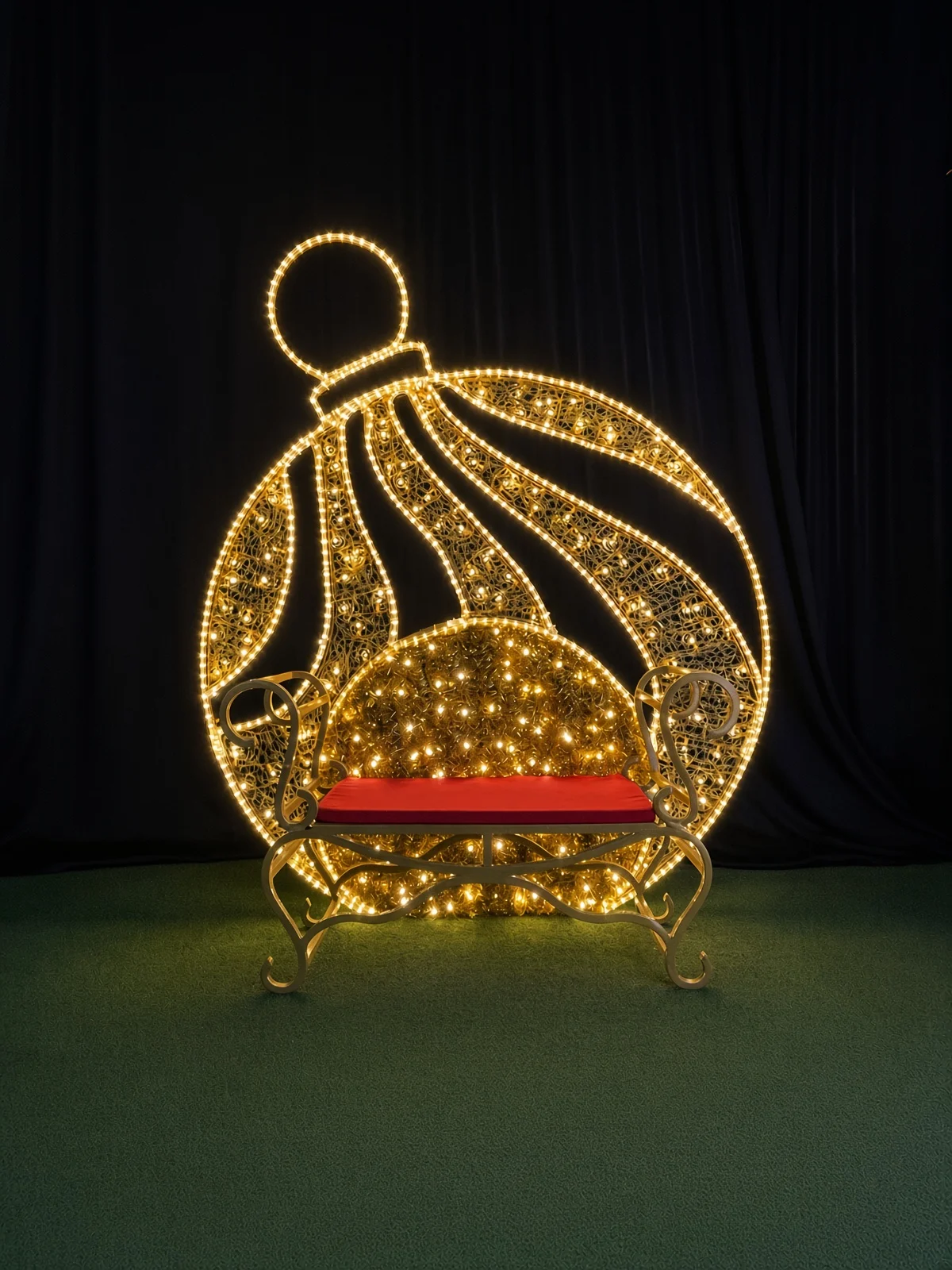 Enhance your commercial holiday display with this stunning LED-lighted Christmas bauble seat, a perfect seasonal photo opportunity for shopping malls.