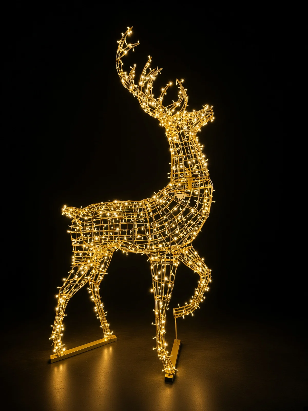 Add festive magic to your holiday display with this elegant, pre-lit wireframe reindeer featuring warm white LED lights.