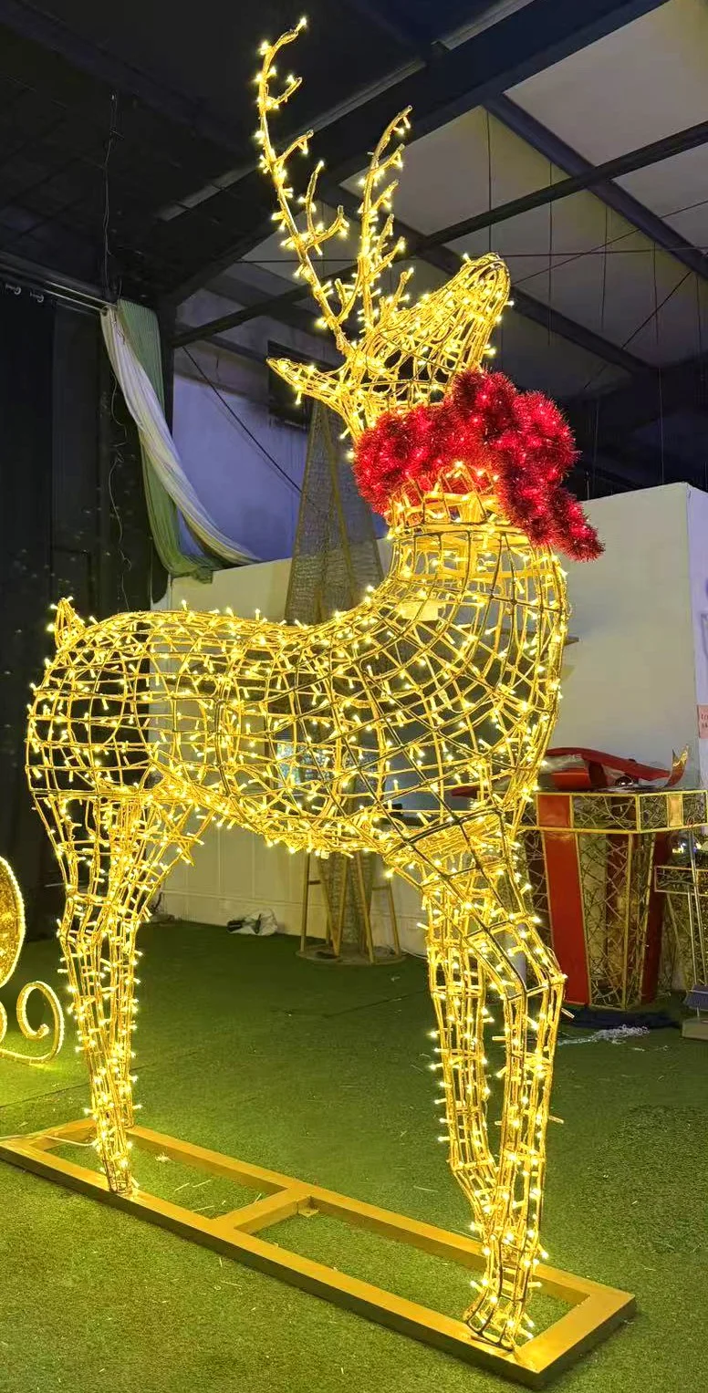 Add a festive touch to your holiday retail displays with this pre-lit golden wireframe reindeer sculpture.