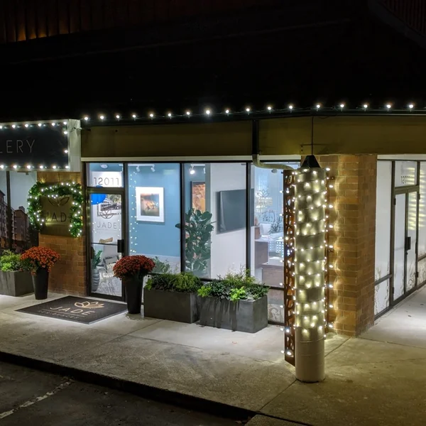 Commercial property features professionally installed exterior holiday lights for enhanced curb appeal.