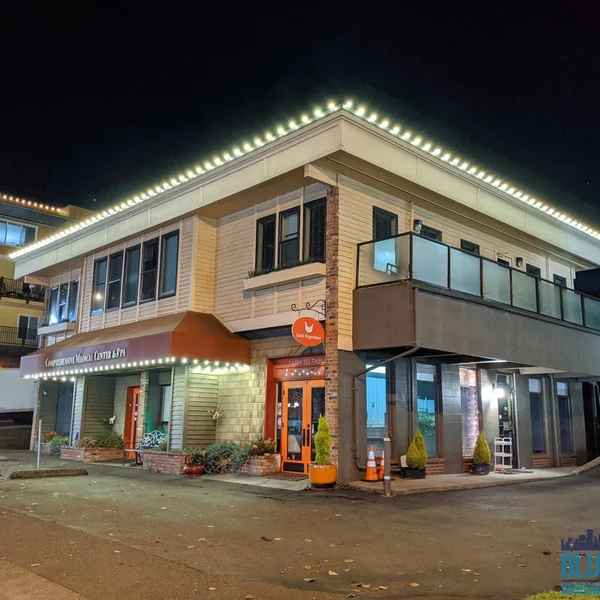 Commercial building with clean roof, windows, and surface after professional exterior cleaning services.