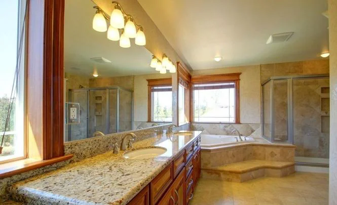 Luxurious bathroom with granite countertops