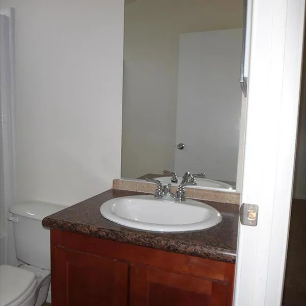 A pristine bathroom design found within one of our ADU models, showcasing a commitment to quality in a smaller footprint.