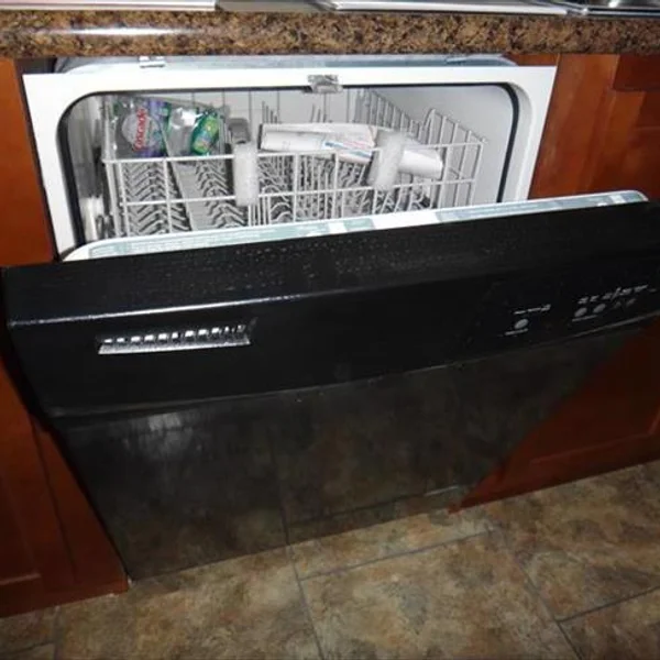 This sleek black dishwasher is ready to be installed in your new ADU or manufactured home, offering modern convenience in a compact space.