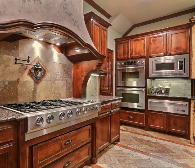 Rustic kitchen remodel with wood cabinets serviced by Synergy Appliance Repair